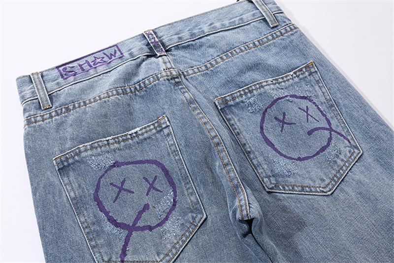 EXTINCTION DISTRESSED DENIM JEANS