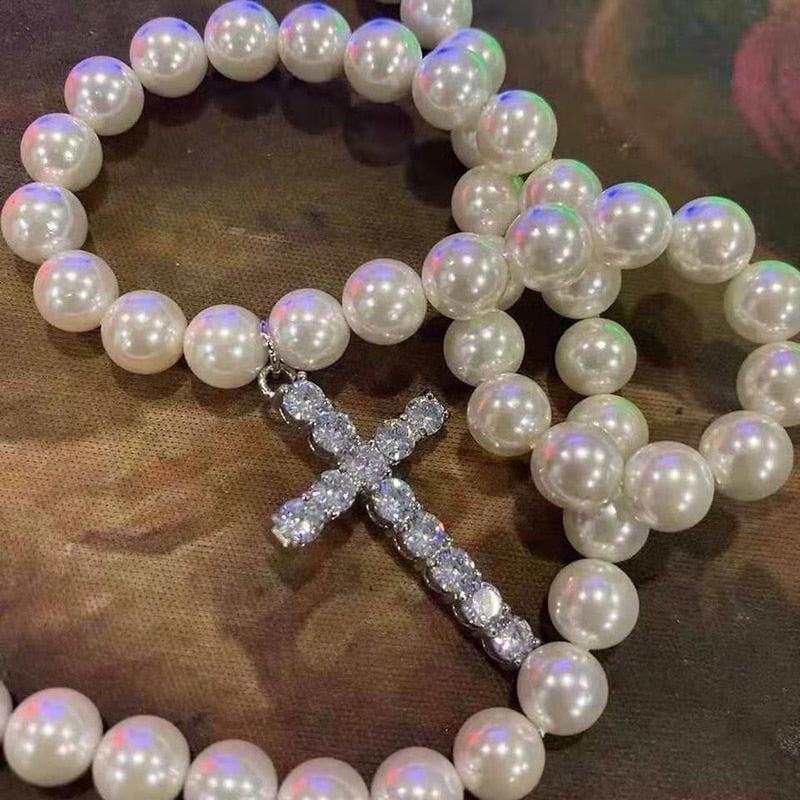 WHITE PEARLS CROSS NECKLACE