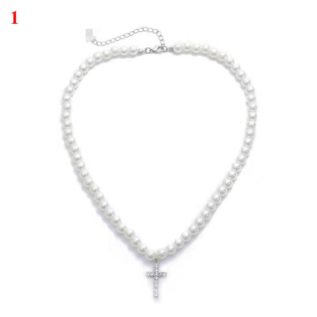 WHITE PEARLS CROSS NECKLACE